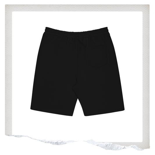 Black shorts with white text 